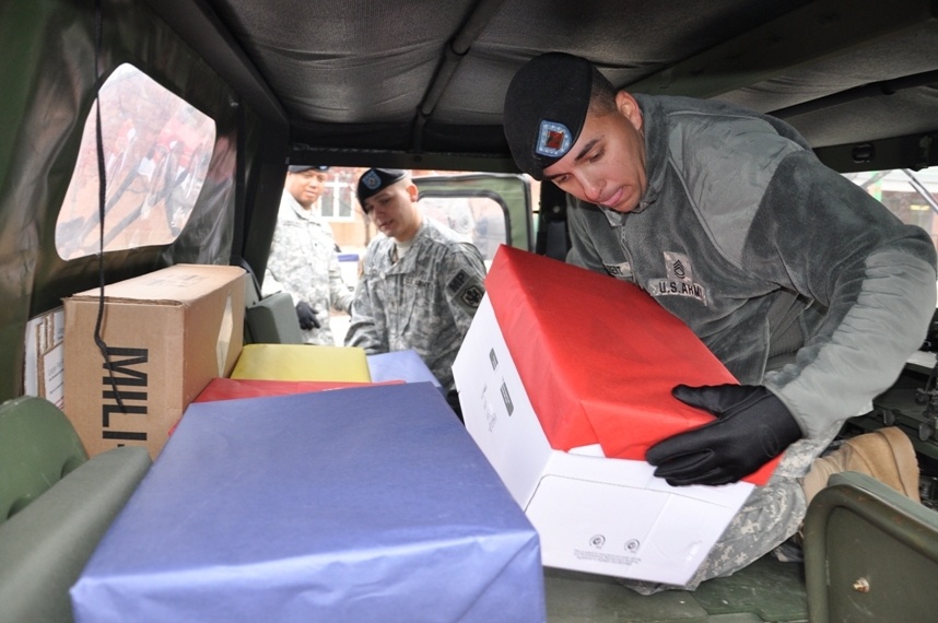 Tots share treats with troops, Afghan kids