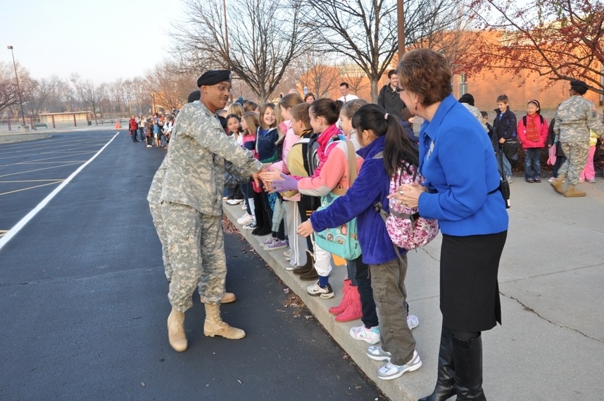 Tots share treats with troops, Afghan kids