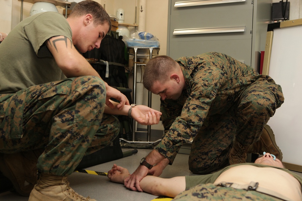 BLT 1/1 corpsmen teach Marines enhanced combat lifesaving techniques during C2X