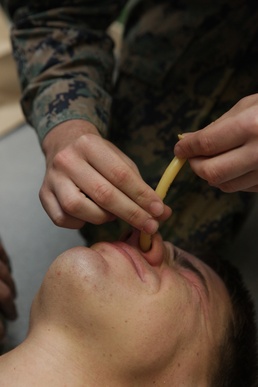 BLT 1/1 corpsmen teach Marines enhanced combat lifesaving techniques during C2X