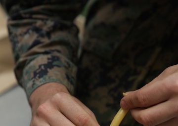 BLT 1/1 corpsmen teach Marines enhanced combat lifesaving techniques during C2X