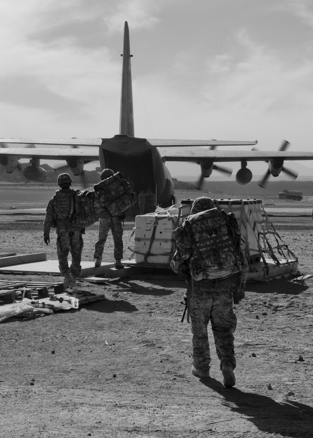 Soldiers Prepare To Embark a C-130