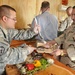Soldiers enjoy Thanksgiving meal on remote outpost