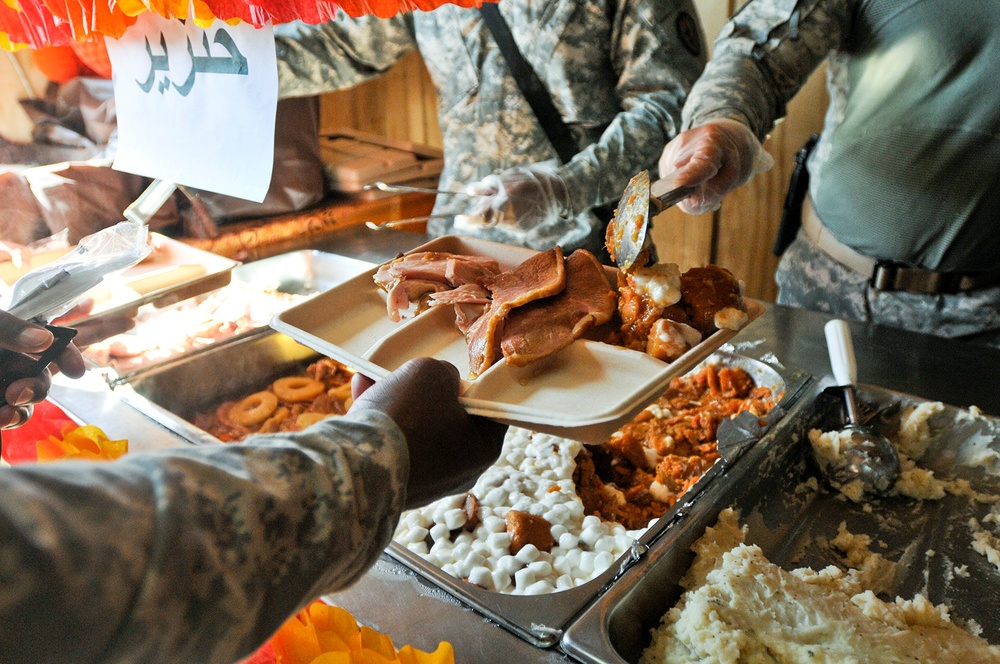 Soldiers enjoy Thanksgiving meal on remote outpost