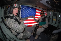 Soldier re-enlists on helicopter over southern Iraq