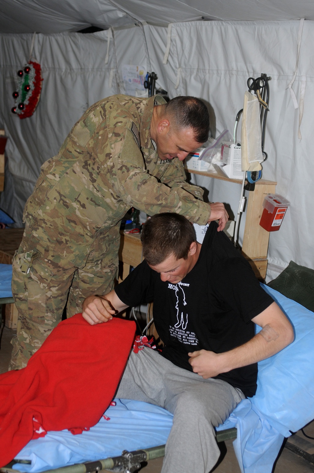 TF Patriot commander pins Purple Heart recipient