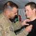 TF Patriot commander pins Purple Heart recipient