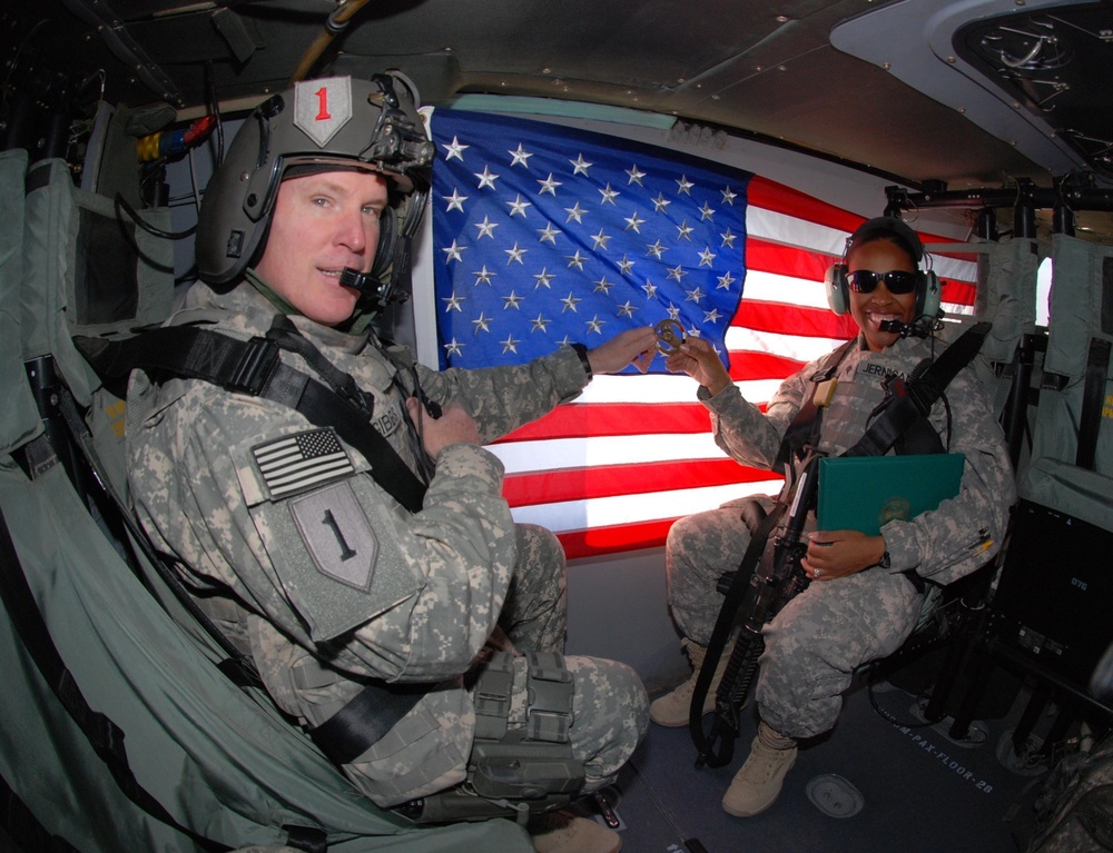 Flying high again: Soldier reenlists on helicopter over southern Iraq
