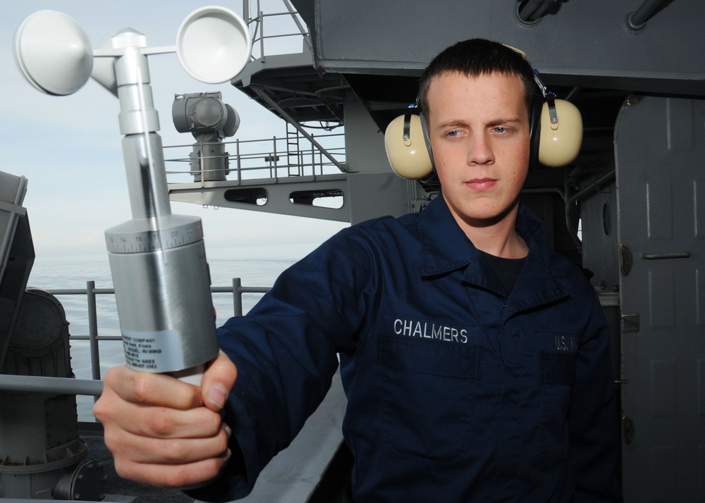 Sailor Measures Wind Speed Aboard the USS Carl Vinson