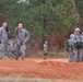 Paratroopers jump from helicopters