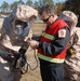 Inspection officer helps HAZMAT technician