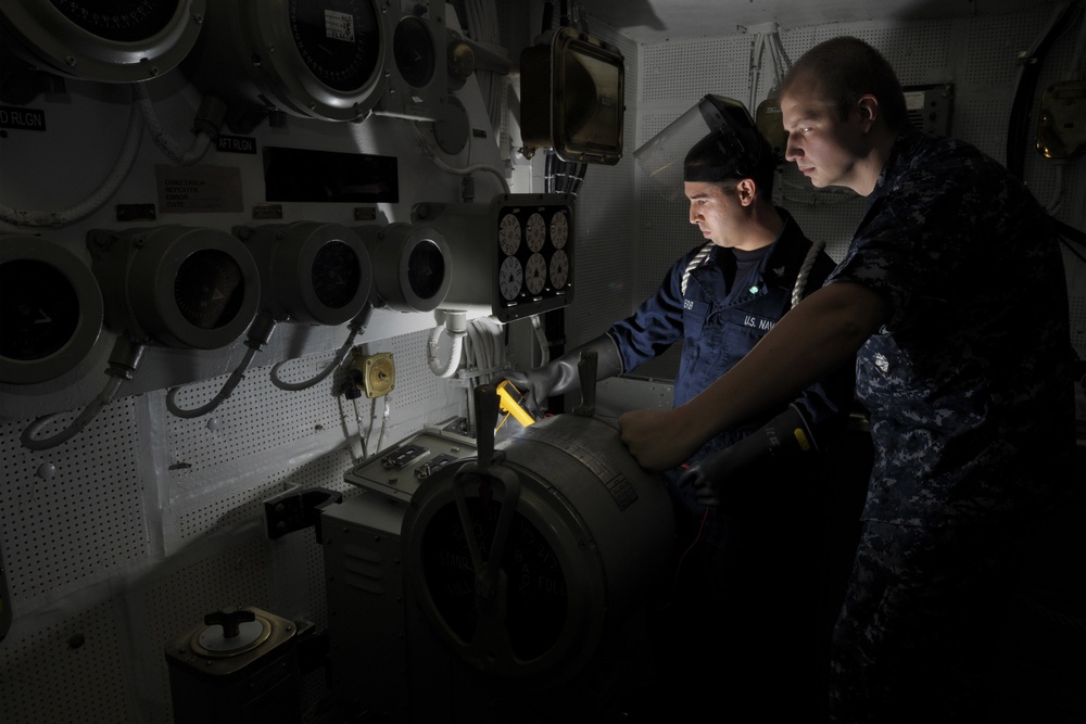 USS Carl Vinson Sailors Perform Maintenance Sea Tel System