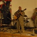 Audience members step in to jam during 4ID Band concert in Iraq