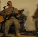 Audience members step in to jam during 4ID Band concert in Iraq