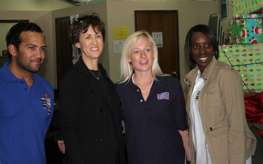 Wife of Army Chief of Staff and family advocate Sheila Casey pays a Christmas Eve visit to service members in Kuwait