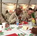 Commandant, sergeant major of the Marine Corps shares Christmas meal with Marines, sailors of RCT-2