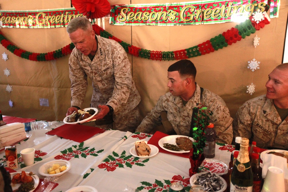 Commandant, sergeant major of the Marine Corps shares Christmas meal with Marines, sailors of RCT-2