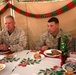 Commandant, sergeant major of the Marine Corps shares Christmas meal with Marines, sailors of RCT-2