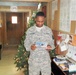 Quartermaster Soldiers exchange Christmas cards with children