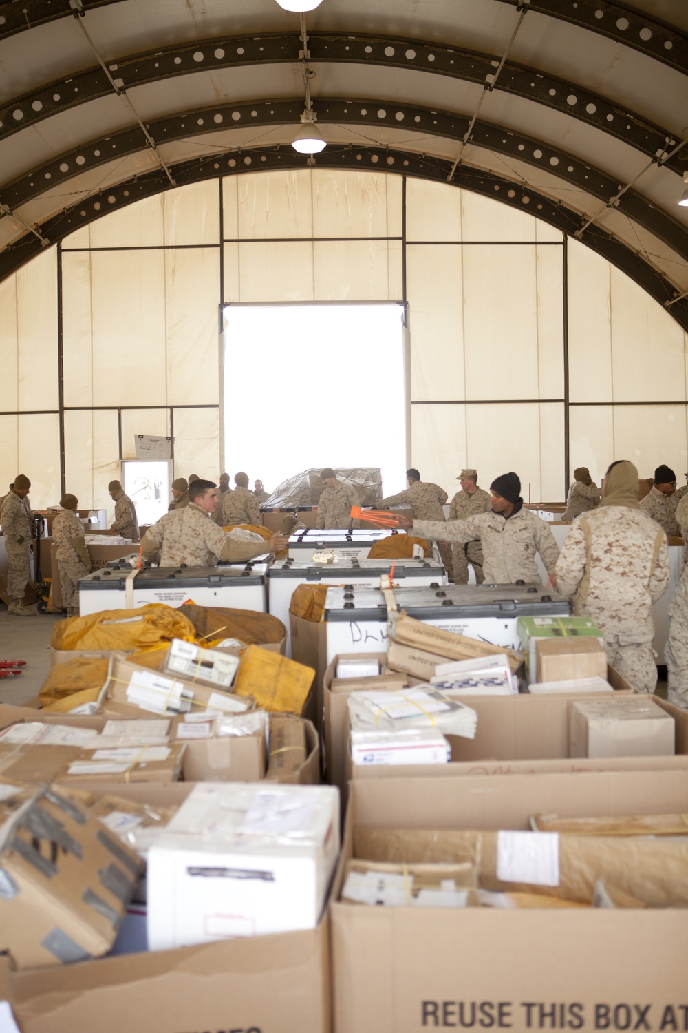 Marines sort holiday mail at Camp Leatherneck, Afghanistan