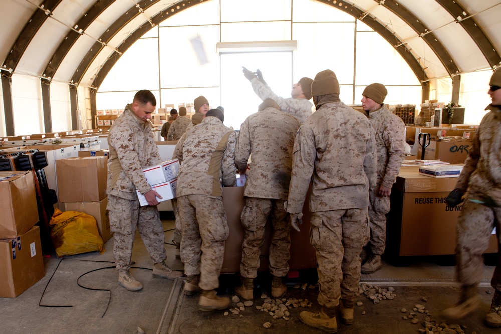 Marines sort holiday mail at Camp Leatherneck, Afghanistan