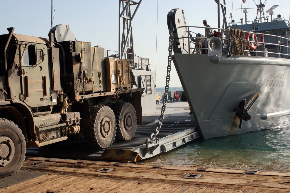 Joint efforts ensure USS Carter Hall lands in time for Christmas