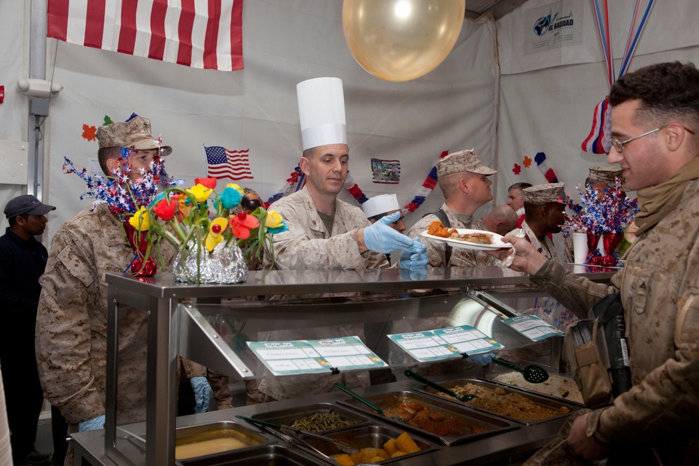 1st MLG (FWD) officers and senior enlisted serve Christmas feast