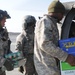 Soldiers serving Soldiers Christmas dinner in remote locations in RC(North)