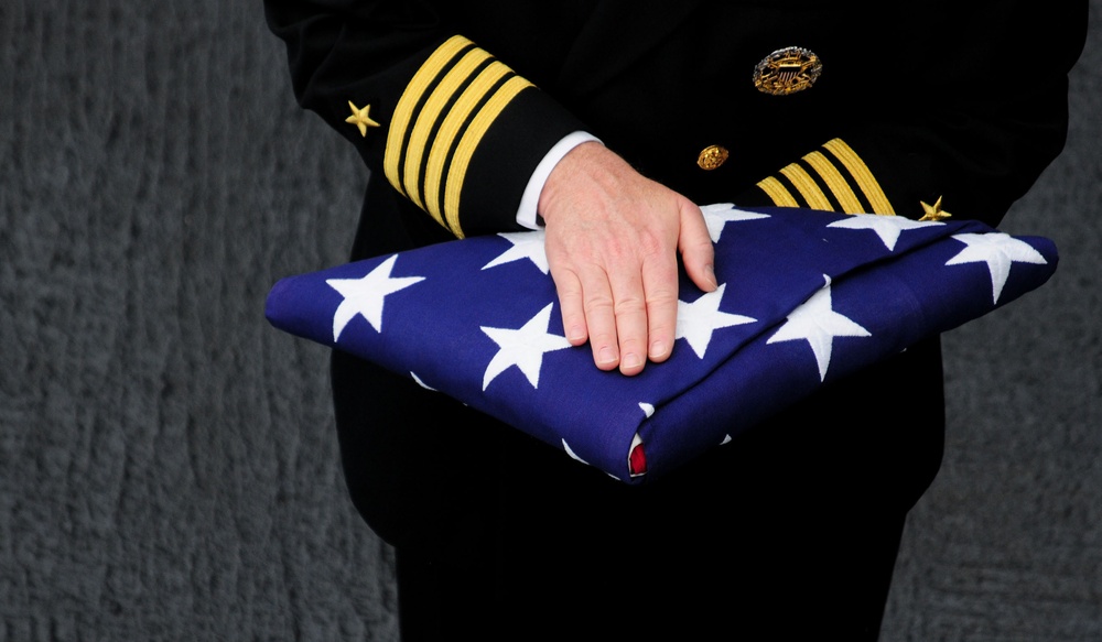 Sailors perform burial-at-sea ceremony