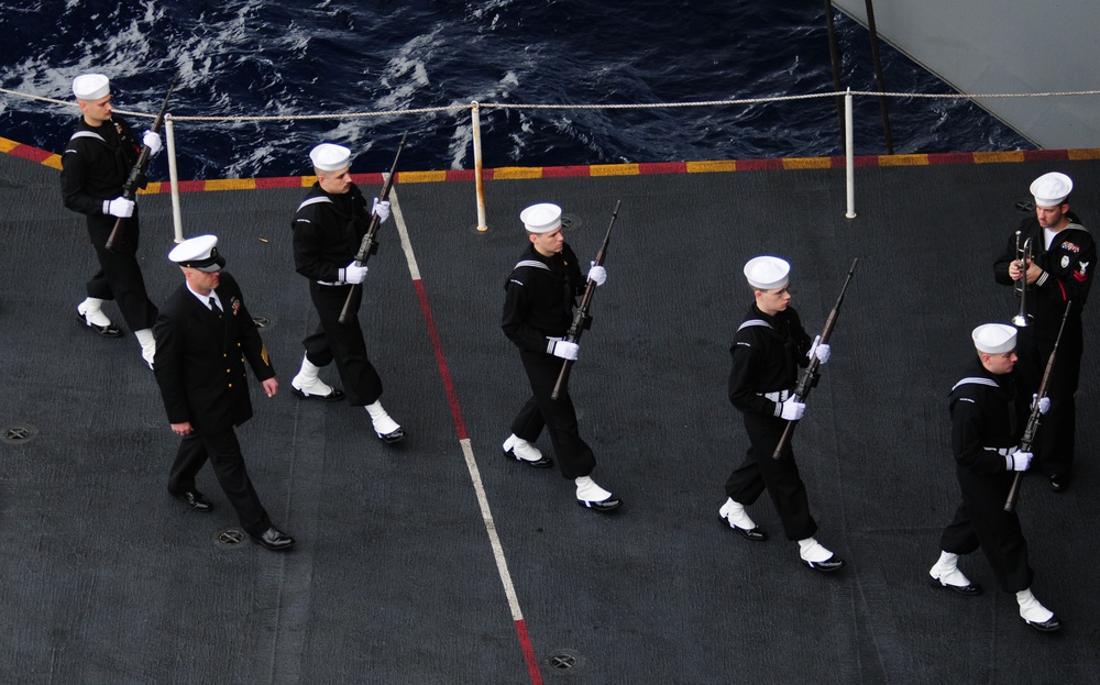 Sailors perform burial-at-sea ceremony