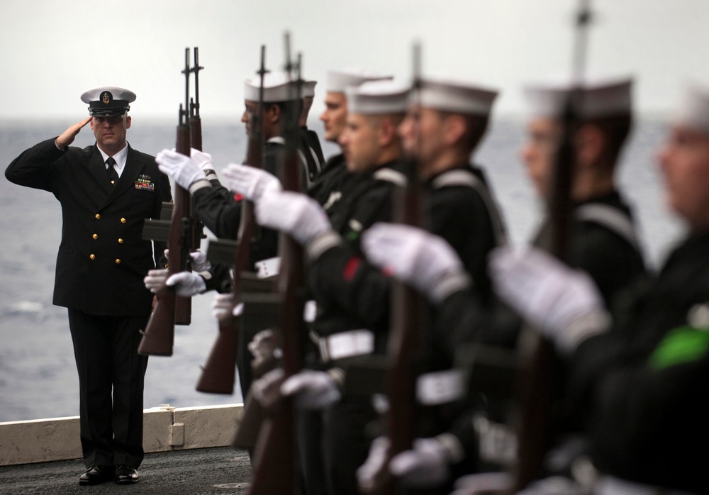 Sailors perform burial-at-sea ceremony