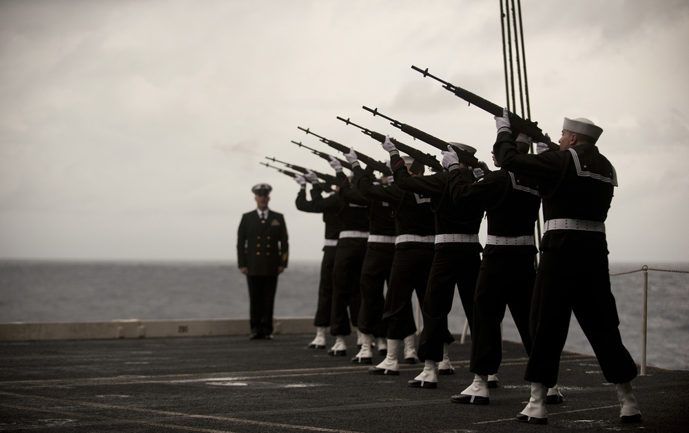 Sailors perform burial-at-sea ceremony