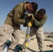 Expeditionary airfield Marines lay ground work for landing aircraft