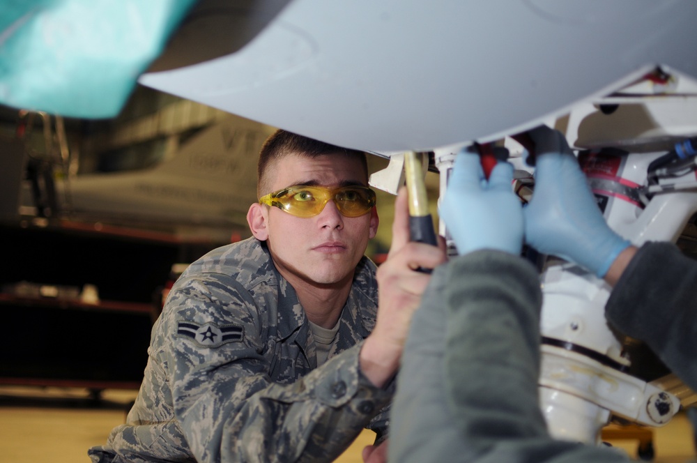 DVIDS - Images - Airman 1st Class Kreager Replaces Nose Wheel Steering ...