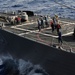 USS Carl Vinson takes on supplies