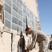 India Company, 3/5 Dark Horse Marines use solar power to brighten mission accomplishment