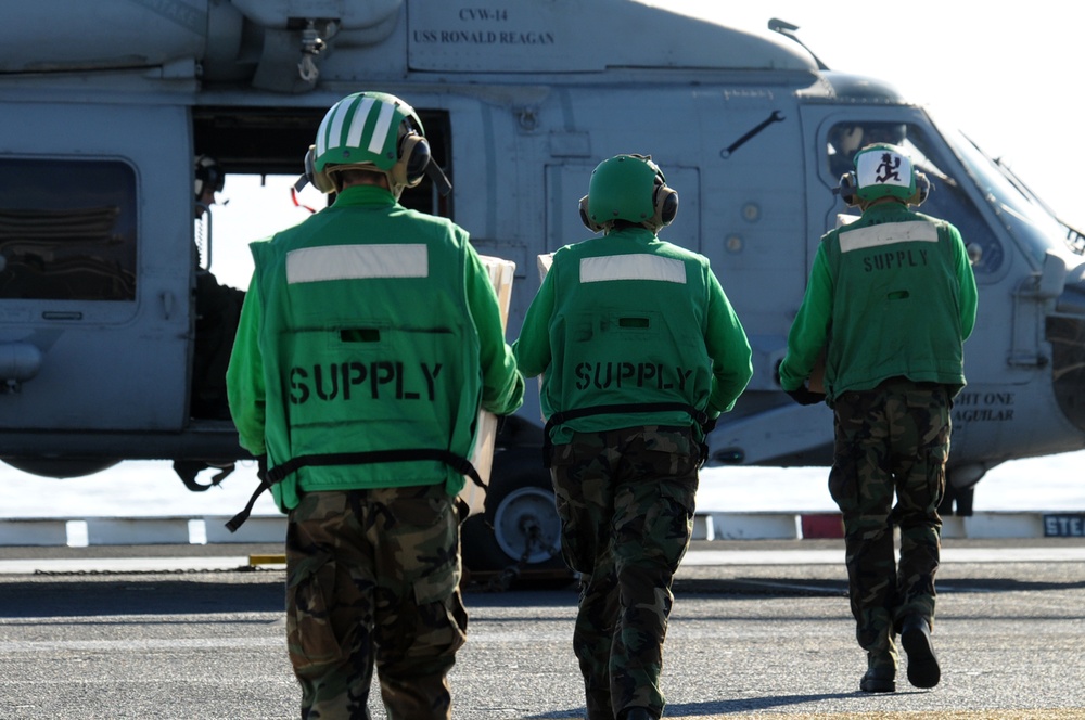 USS Ronald Reagan crew carries on daily operations