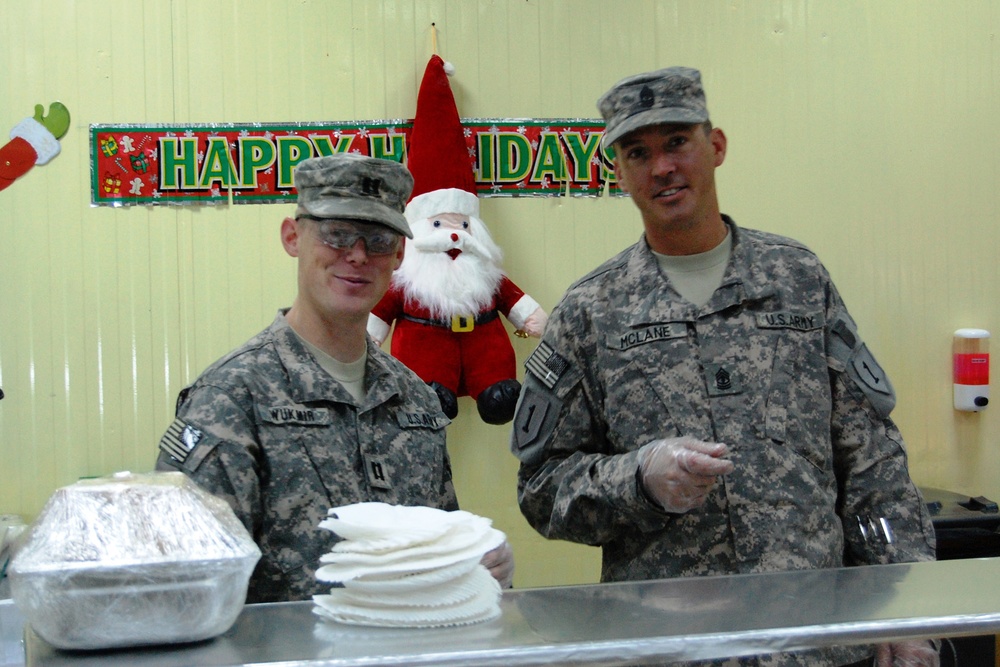 USD-C soldiers enjoy Christmas dinner at Camp Taji, Iraq
