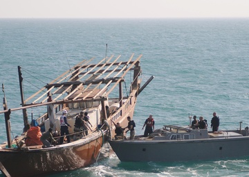 Sailors help fisherman