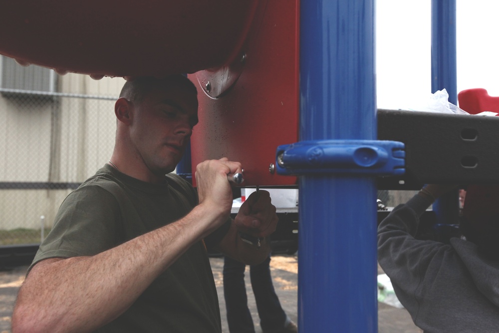 Marines team up with non-profit to build playground