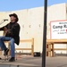 Country singer Michael Peterson performs in Iraq