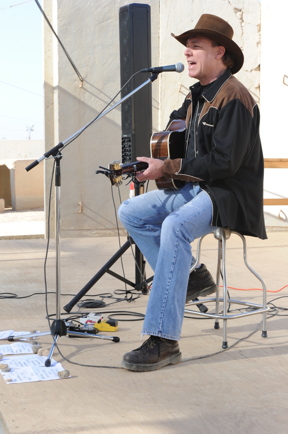 Country singer Michael Peterson performs in Iraq