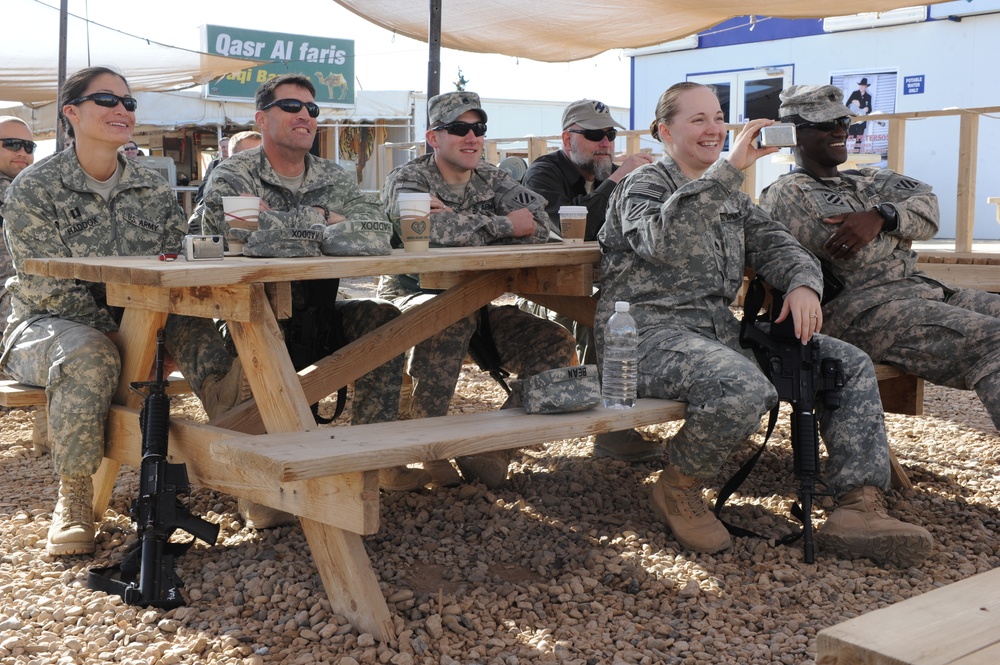 Country singer Michael Peterson performs in Iraq