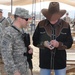 Country singer Michael Peterson performs in Iraq