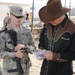 Country singer Michael Peterson performs in Iraq