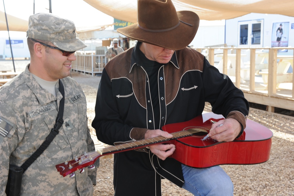 Country singer Michael Peterson performs in Iraq