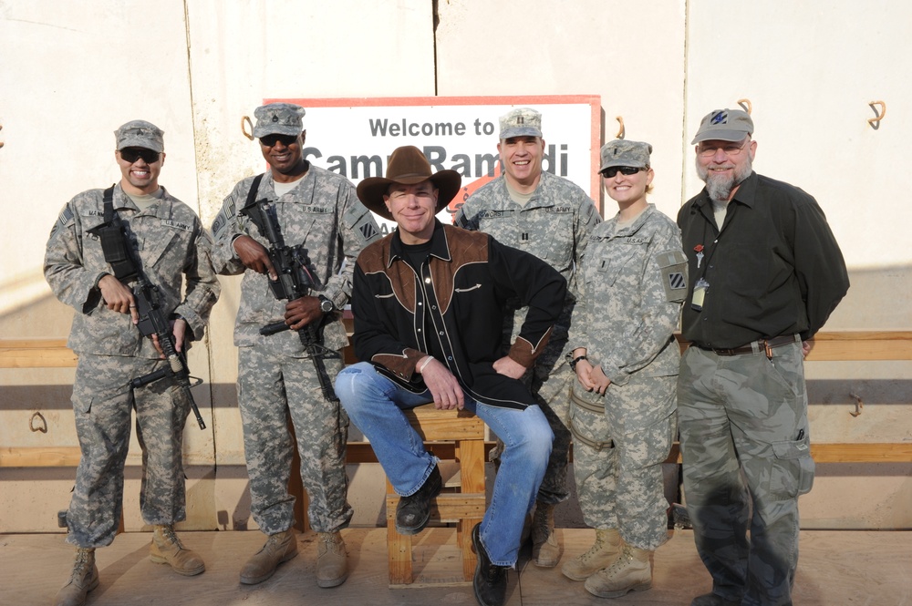 Country singer Michael Peterson performs in Iraq