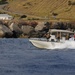 US Coast Guard Maritime Safety and Security Team (MSST) 91114 patrols the coastline of Guantanamo Bay