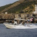 US Coast Guard Maritime Safety and Security Team (MSST) 91114 patrols the coastline of Guantanamo Bay