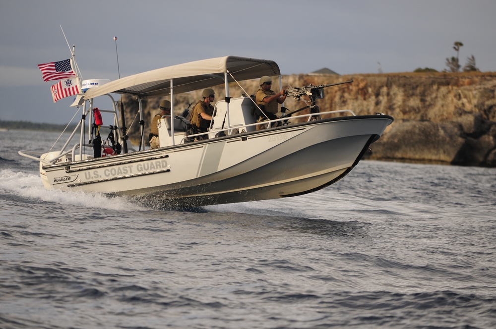 US Coast Guard Maritime Safety and Security Team (MSST) 91114 patrols the coastline of Guantanamo Bay